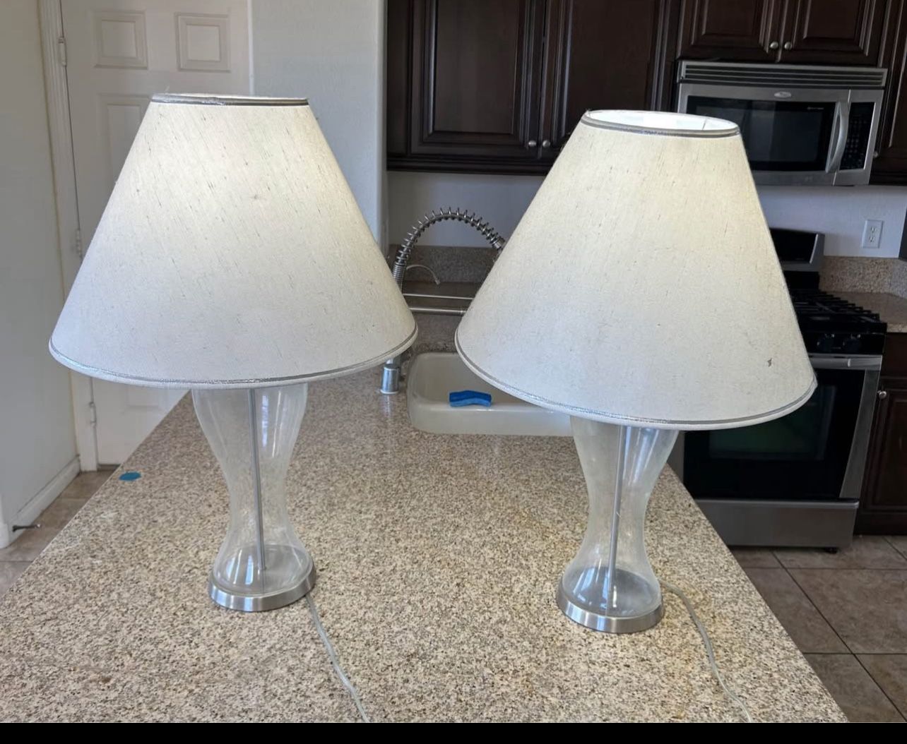 Two 26 in tall Glass table lamps(can be used with 3 way brightness bulbs)
