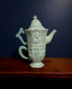 Light green ceramic Disney Alice in Wonderland stackable teapot and teacup