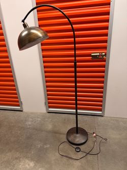 industrial-style arched metal floor lamp