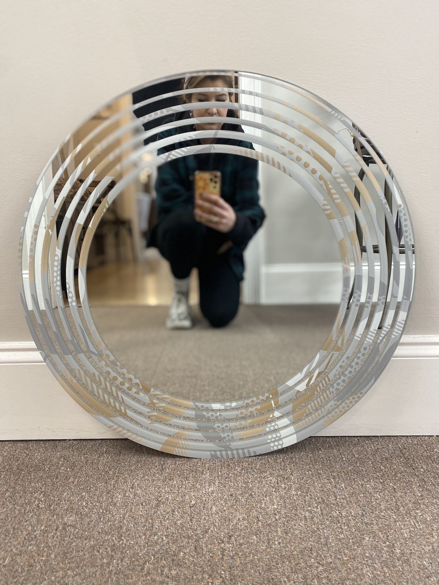 {ONE} Wave luxury geometric fall modern wall mirror - 24” x 24”. Finish: gold/frosted white. MSRP: $157. Our price: $85 + Sales tax