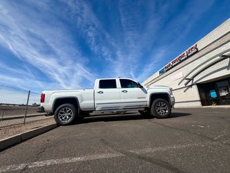 GMC Sierra wheels tires leveling & lift kits accessories lights side steps bed covers installations. Alignments. ( We Finance)