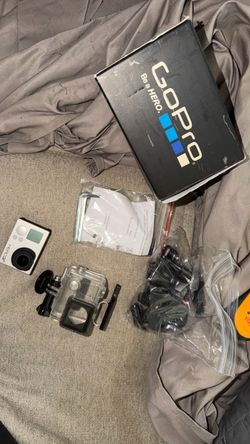 GoPro HERO3+ Silver with case, box, and mounts