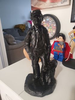vintage 14-inch chalkware or resin coal miner statue
