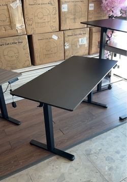 55 inches black standing desk with the small defect