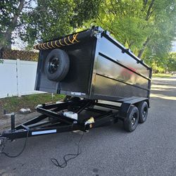 BRAND NEW DUMP TRAILER 8X12X4 12,000 LBS ROLLING TARP AND SPARE TIRE HYDRAULIC SYSTEM ELECTRIC BRAKES TITLE IN HAND FOR ANY QUESTION TEXT ME PLEASE