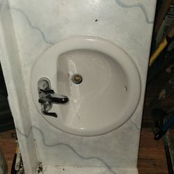 Sink, Faucet, And Counter With Backsplash Size 36x22 1/2