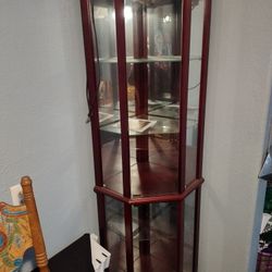 Corner Curio Cabinet With Interior Light , Cherry wood Finish With Glass Doors And Shelves 