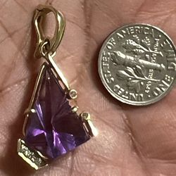 14k Yellow Gold Large Carved Amethyst,  and diamonds pendant