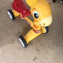 Radio Flyer Lil' Racers Patches the Giraffe ride-on toy for toddler