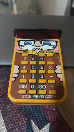 Vintage hand held little professor calculator