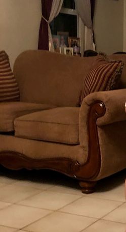 Brown Couches (love seat and family sofa)