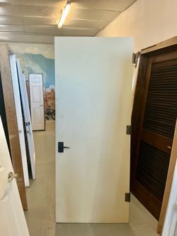 Solid flat panel interior door
