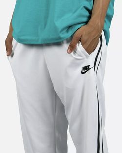 Nike Black and White Sweatpants with zippered bottoms and pockets