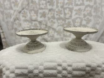 Set of two distressed metal cake/candle stands