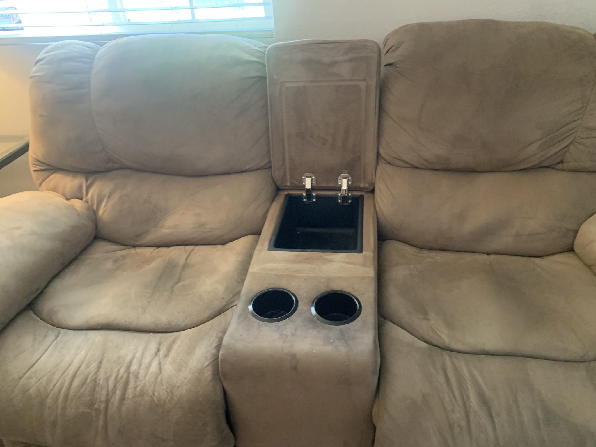 Tan Reclining Sofa and Matching reclining love Seat