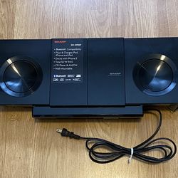 Sharp DK-KP85P Slim Micro System features a top-mounted dock for Apple Lightning devices The system also supports Bluetooth technology for wireless