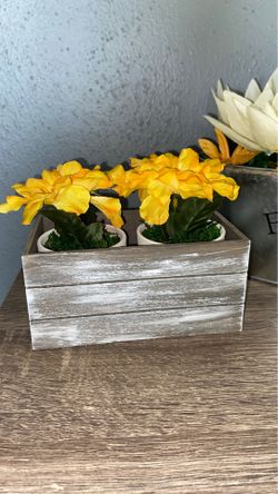 Fake plant in planter box