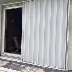 Paneles De Acordeón Contra Huracanes 