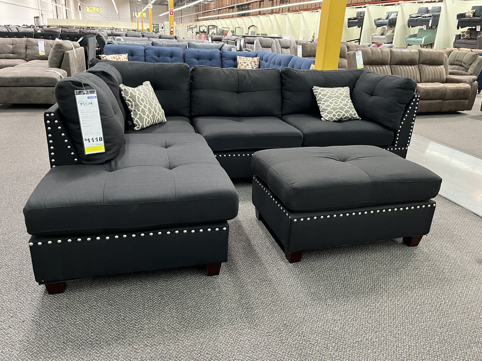 New Reversible Nailhead Sectional . Black . 104” X 75”. Free Delivery !