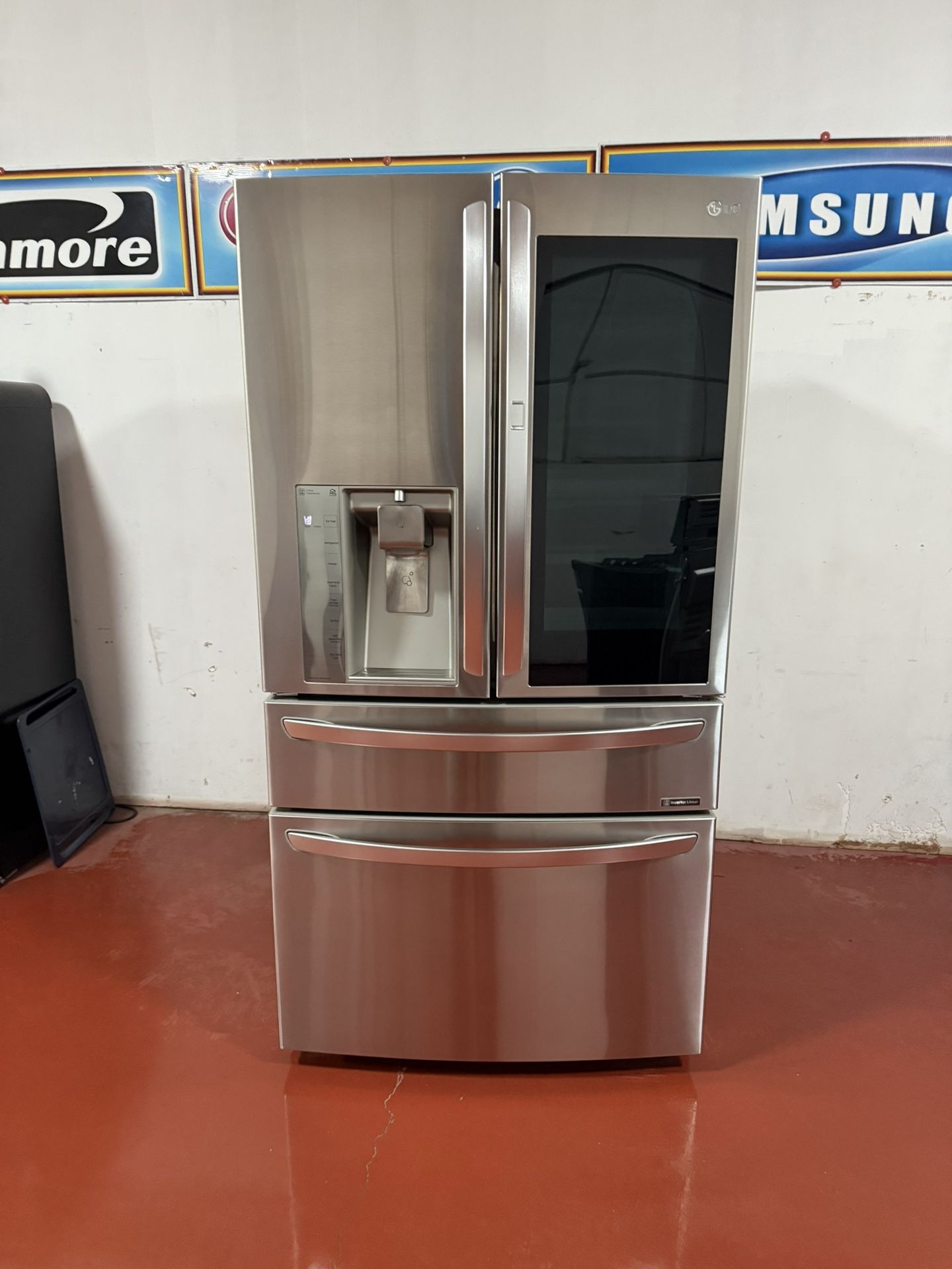 LG 4-door refrigerator with water and ice dispenser, in perfect working condition. Dimensions: 35 3/4" (W) x 32 1/8" (D) x 70" (H). Home delivery and