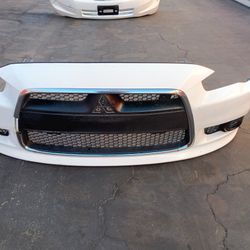 2008-2015 Mitsubishi Lancer Complete Front Bumper With All The Accessories Oem. 