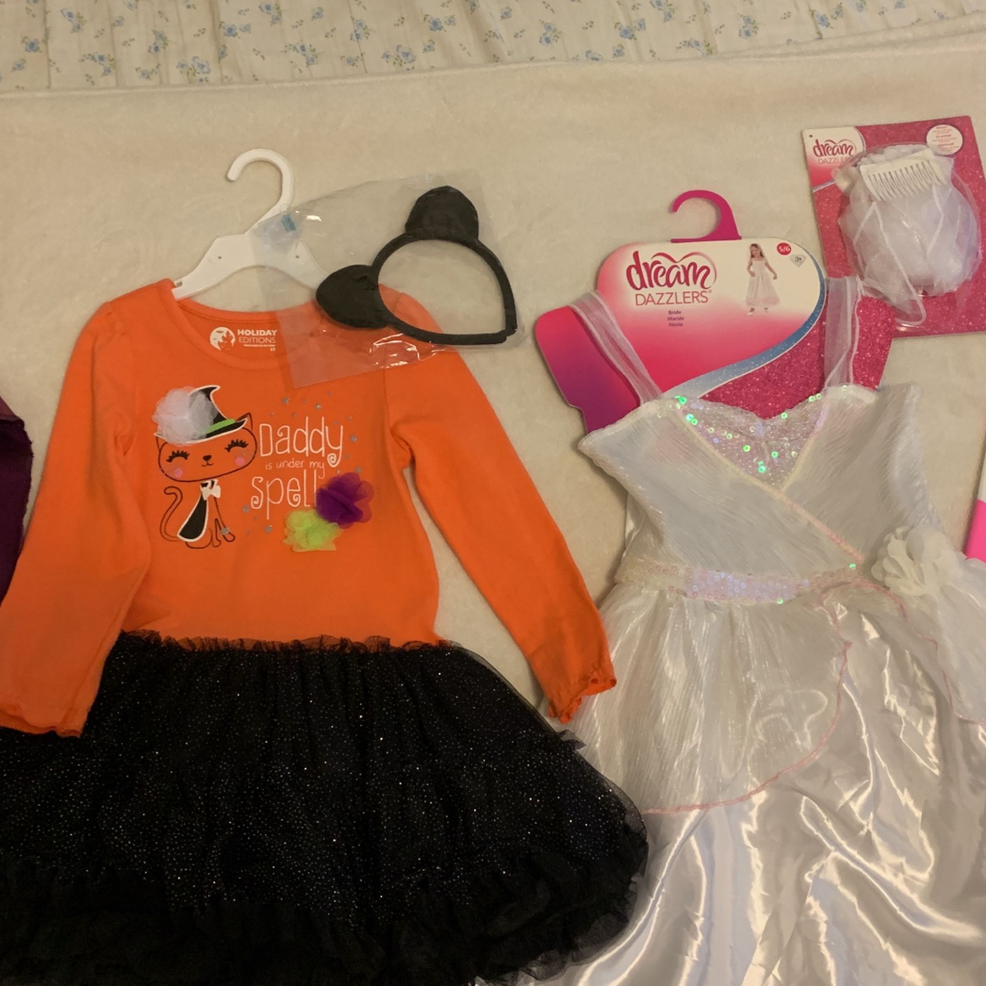 Capes $5 Each & Dresses $5 Each