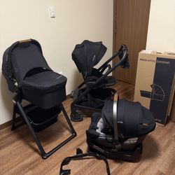 Nuna Mixx Stroller and  Car Seat and Bassinet and Stend