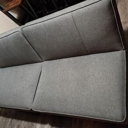 Two dark gray futons