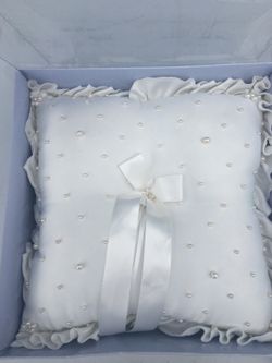 Ring pillow and rose petals