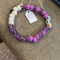 Purple Bracelet With Charms 