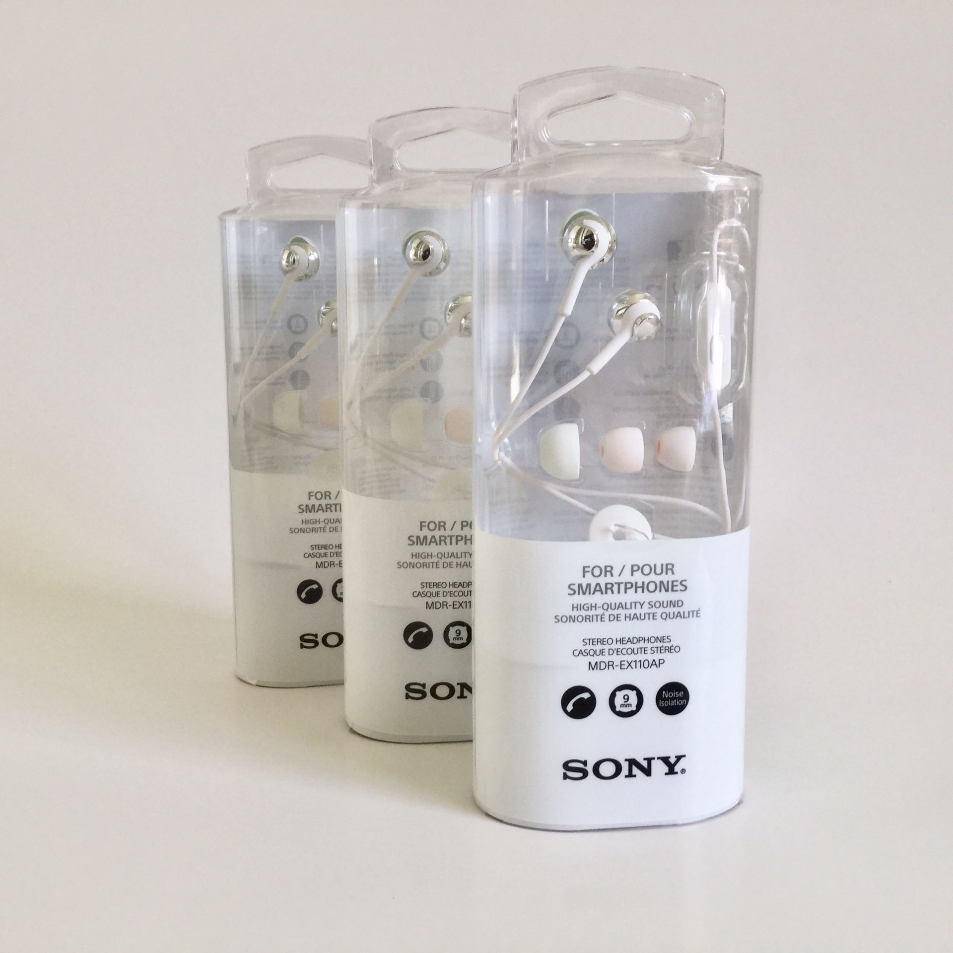 Three White Sony Stereo Headphones MDR-EX110AP