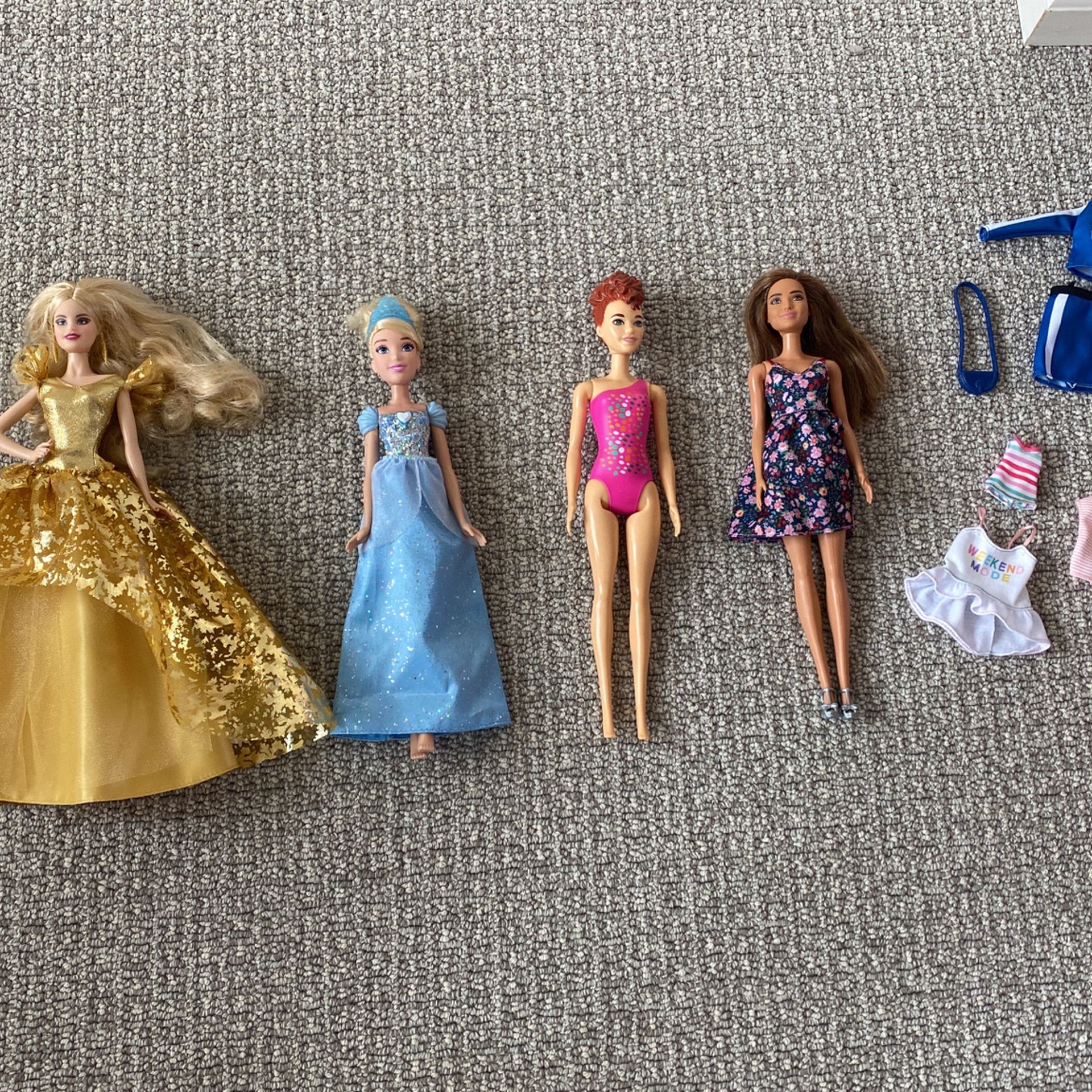 5 Barbie Dolls and Clothes 