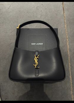 YSL woman’s handbag purse