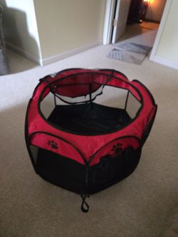 Small pet flexible folding cage.