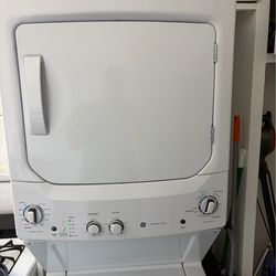 One year-old stackable washer, dryer in absolute excellent condition