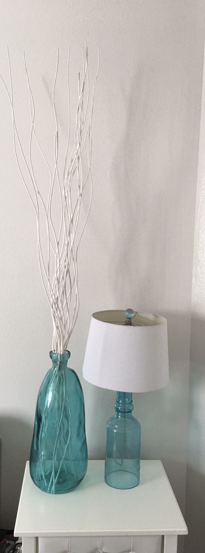 Teal / blue glass lamp and vase with branches
