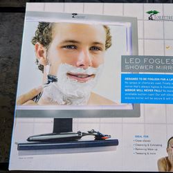 Light up shower mirror