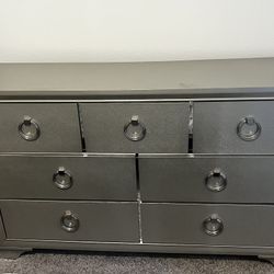 Silver/Grey Glass Type BedRoom Dresser. PRICE IS NON NEGOTIABLE SO PLEASE DONOT ASK FOR A LOWER PRICE 