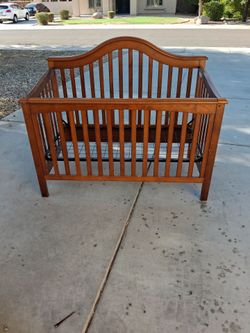 Wooden crib and changing station