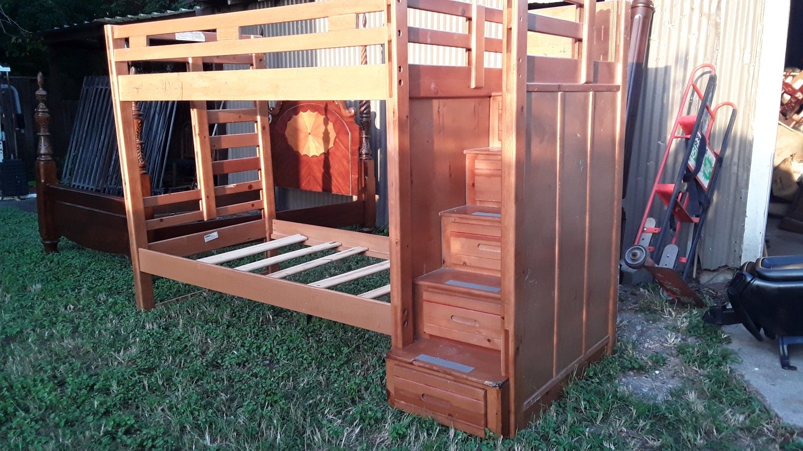 Solid wood twin over twin bunk bed with ladder storage good condition asking 440 delivered or best