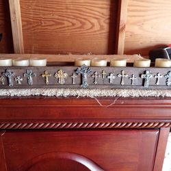 Wooden candlestick with metal crosses, collectible