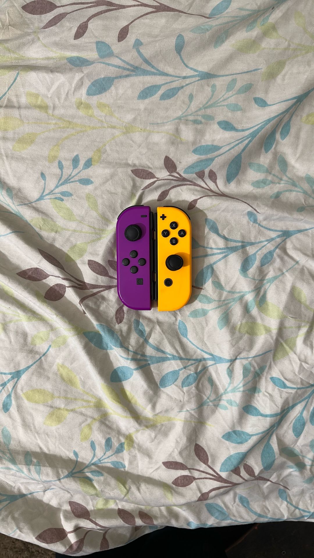 Nintendo Switch Controllers Purple, And Orange