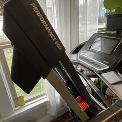 Pro-Form Treadmill In Folded Position.