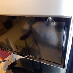 Adjustable TV Entertainment center TV included