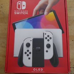 Nintendo Switch OLED Model HEG-001 Handheld Console - 64GB - White  used. tested. in a good working order. 
