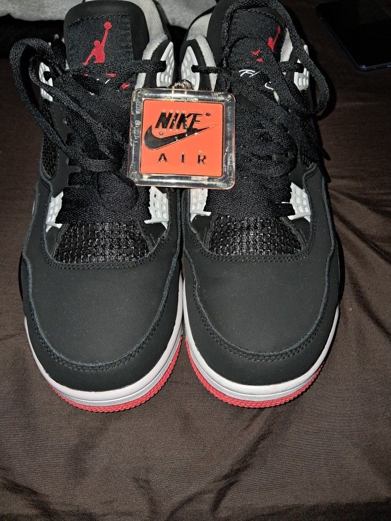 JORDAN SIZE 13 4S BLACK AND RED