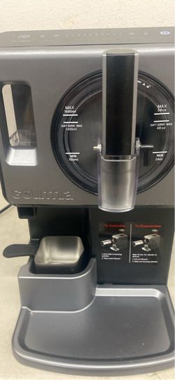 Gourmia 2qt soft serve/ slushie maker includes the chocolate melting cup and tray.
