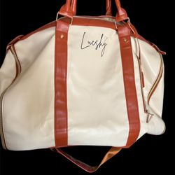 Lucshy Beige Duffle Bag ($100)