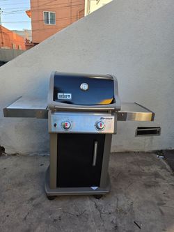 Weber spirit grill/ Asador