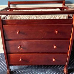 baby crib and chest of drawers